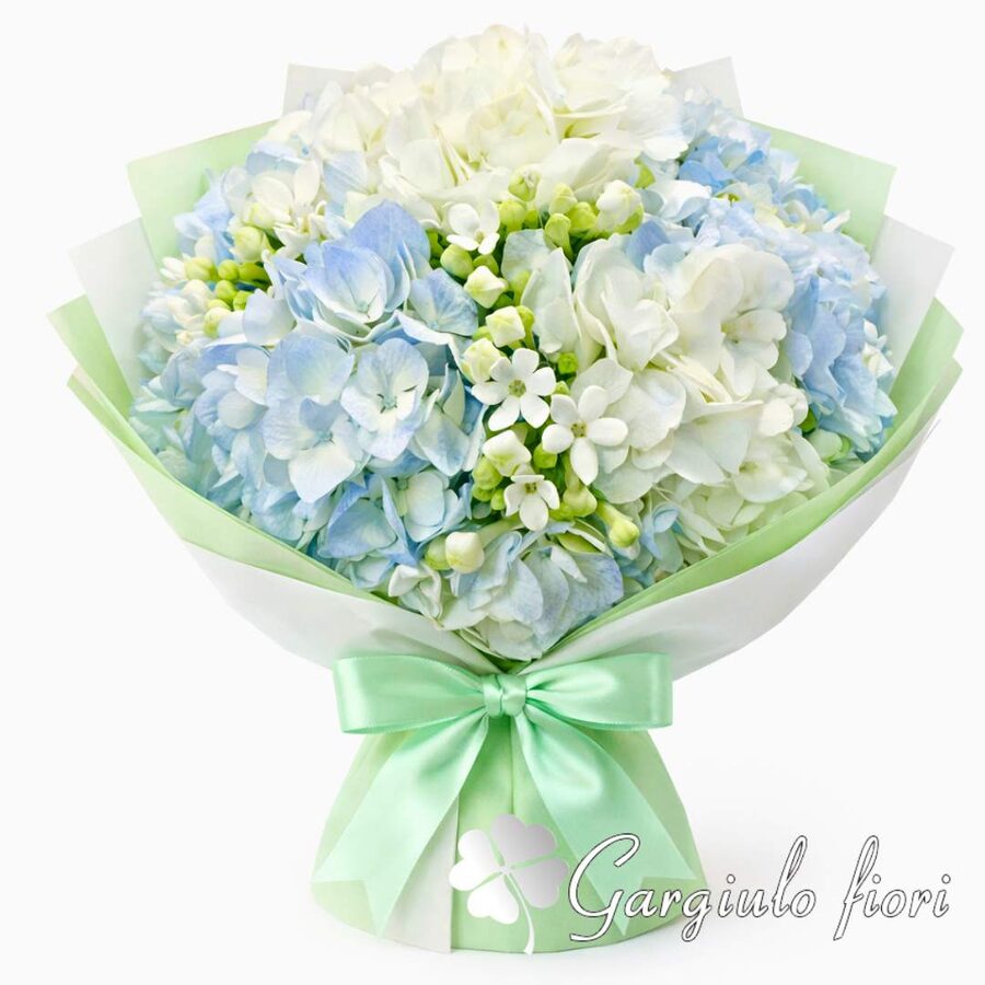Bouquet di fiori misti colorati con gerbere gialle e rose arancioni